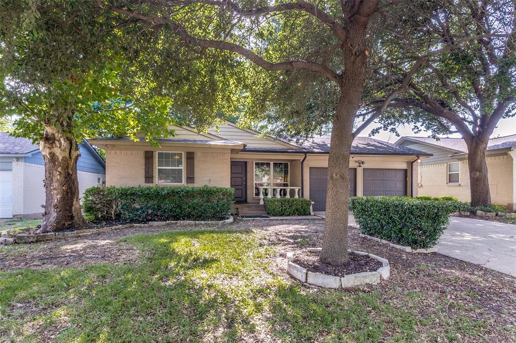 Welcome home to this beautiful property featuring a two-car garage and mature shade trees that provide excellent curb appeal. Inside, you'll find gorgeous hardwood flooring throughout, exquisite trim work, granite countertops, a commercial-grade gas cooktop, and stainless steel appliances. Energy-efficient windows and a sliding glass door were replaced in 2011, adding both style and comfort. This move-in-ready home offers quality finishes and timeless charm throughout.