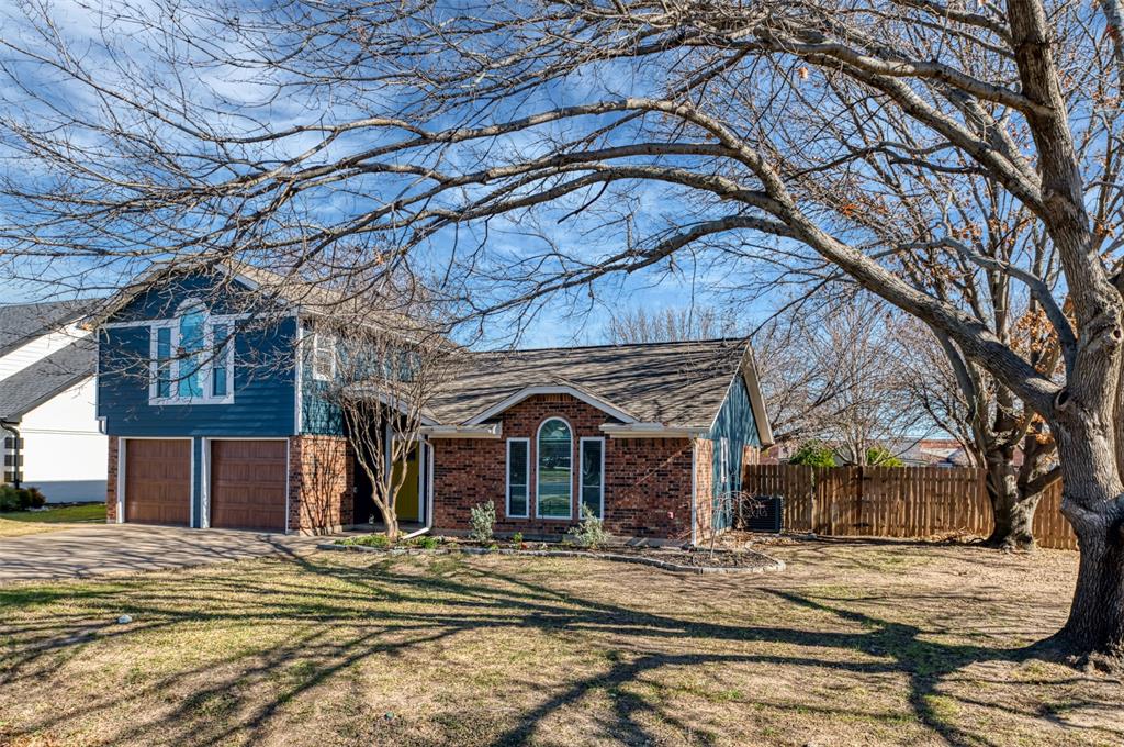 Wonderful Roanoke home that has it all! BRAND NEW ROOF and located on nearly HALF AN ACRE and backs up to Trophy Club, it has NO HOA, low Roanoke property taxes, within the award winning Trophy Club schools and it can all be yours potentially with a ZERO down USDA loan which this home qualifies for. Not only that, it has been freshly painted inside and out, a huge backyard that is fully fenced, with a fire ring and shade trees with string lights, large covered patio with outdoor ceiling fan. This all gives it an outdoor resort feel. The kitchen has a NEW microwave, quartz counter top, NEW double door refrigerator and recessed lighting. The living room has a wood fireplace with a wall mounted LG 65 in HD LED TV. The living is adorned with wood flooring, recess lighting, wooden propeller style ceiling fan and tastefully done. A large primary bedroom upstairs with wood flooring, NEW mini split heat pump, built-in library wall with built-in cedar chest, roomy walk-in closet and a remodeled bathroom. Ceiling fans throughout. Newer central heat pump and storm door. New shades across the back, led lighting throughout and NEW light fixtures. Sprinkler system front and back. Two car garage with NEW epoxy floor and NEW garage door openers. Large detached walk-in storage shed in backyard. Walking distance to Trophy Club's elementary, middle and high schools (Northwest ISD). Minutes from the 114 fwy, dining, DFW & shopping. This home qualifies for the ZERO down USDA rural residential loan program.