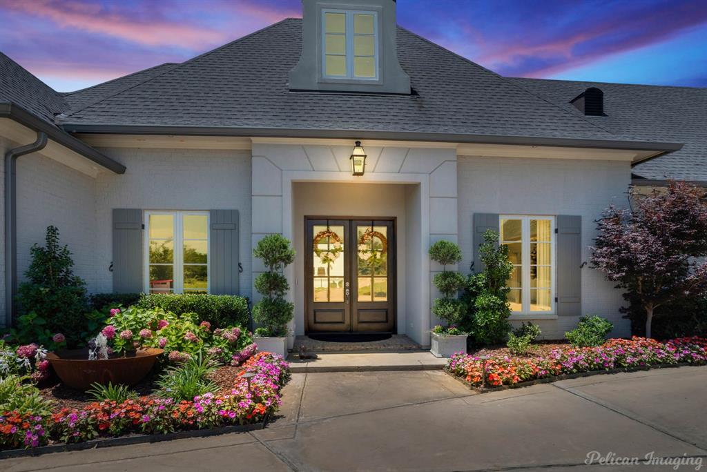 Stunning Cross Lake beauty with breathtaking views of the lake located on approximately 1.2 acres of professionally landscaped grounds. From the moment you enter this fabulous home, enjoy panoramic views from the living spaces , owner's suite and guest suite. The incredible cook's kitchen is perfect for entertaining and is open to the living area with retractable doors to outside entertaining area with fireplace and pool area. The remote owner's suite has a luxurious bathroom, custom closet and accessible office or work out room. Guest suite with full bath and two bedrooms with jack and Jill bath are also downstairs. Upstairs features large playroom-media room. Pool and spa can be heated and have cover. This property is one of a kind!! Pier was designed for golf cart access also.