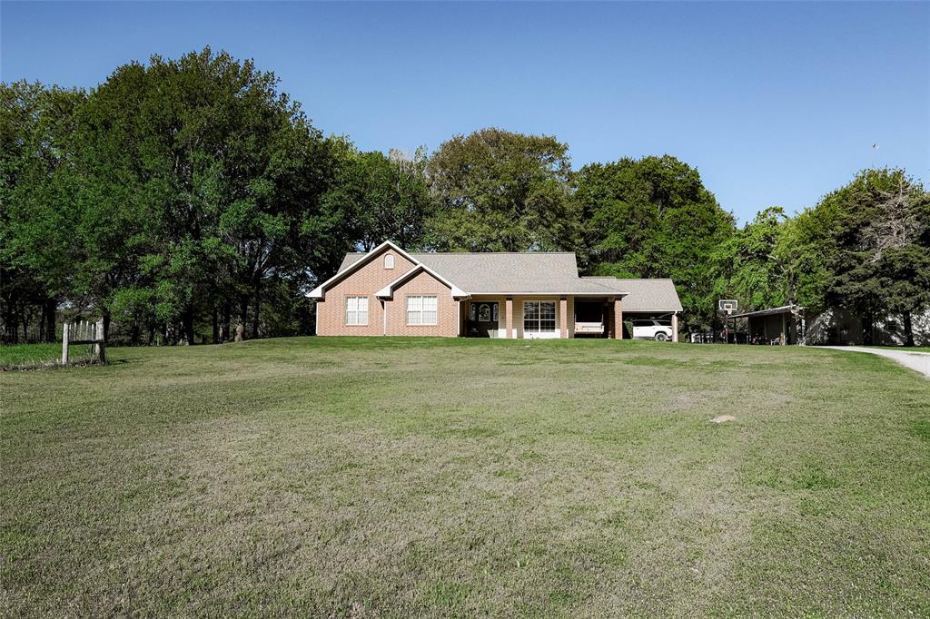 Come enjoy the country feel within minutes of town. This property is a 3 bedroom 2 bath home looking for its next family to enjoy and love. Situated on almost 12 acres you can enjoy peace and quiet with a stocked pond at your disposal. Two car carport, she shed, and a shop designed for all uses. The shop is 36x24 with approximately 3100 sq ft of use. The home being well designed features french drains, goat fence all the way around, gas logs, granite, marble, vaulted ceilings, and the list goes on. Call to set an appointment to see all this property has to offer. All information deemed reliable but should be verified by buyer and buyer's realtor.