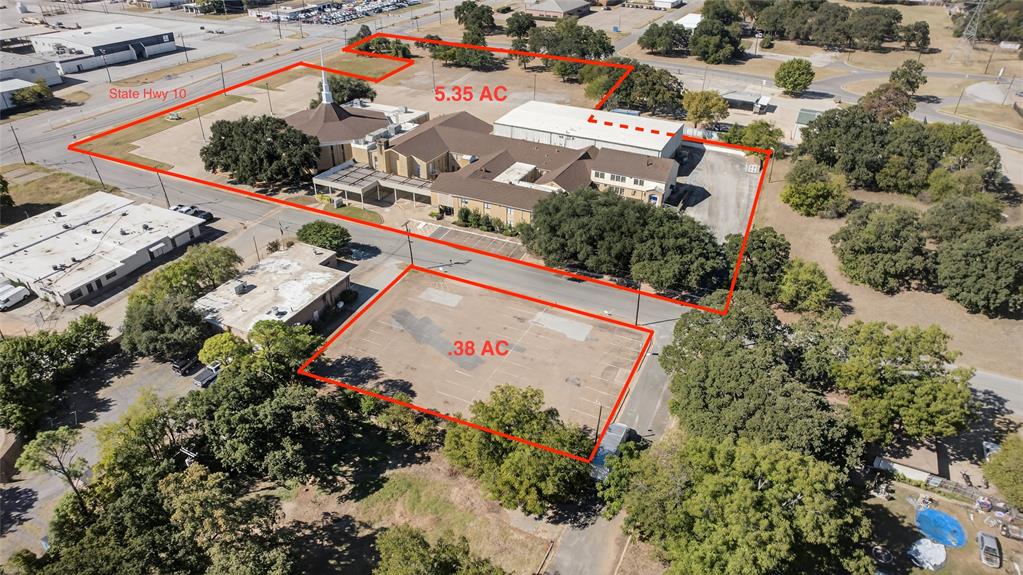 Sprawling campus with approximately 80,000 SF on 5.7 acres, situated in the heart of the DFW area. Property is
highly visible with 500 ft of Hwy 10 frontage (23,000 daily traffic count). 600 seat balconied
sanctuary. Features over 50 office or classroom spaces, Ideal for a growing church or school. Multiple
conference rooms, common areas and kitchens, library, and 6,000 SF gym. Some common area
spaces have been remodeled In the last few years. Facility currently rents to multiple groups, Include
a school, with rental revenue In excess of $70,000 per year.