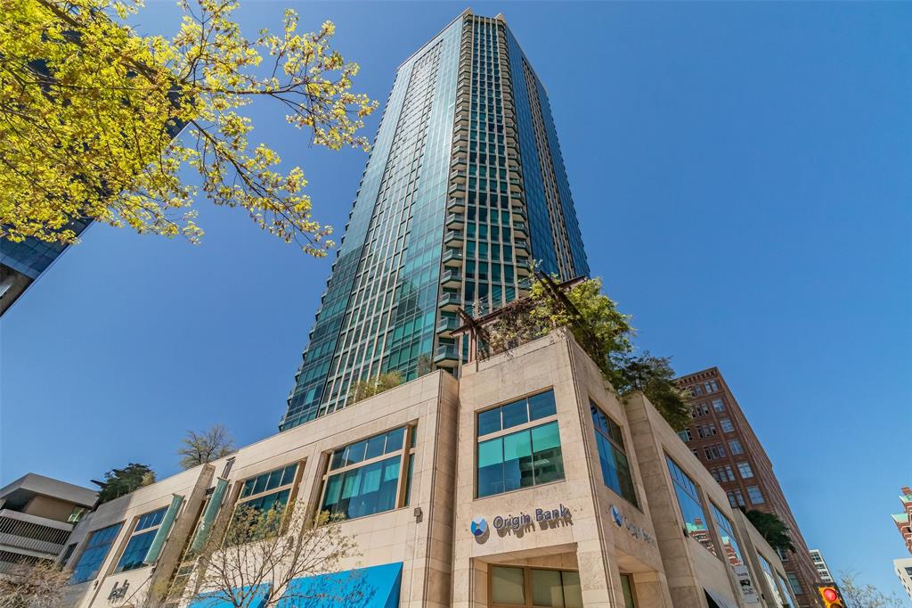 Experience urban living at its finest in downtown Fort Worth from this stunning 25th-floor condo featuring breathtaking northeast-facing city views. This 1-bedroom, 1-bath residence also includes a dedicated study with a built-in desk, perfect for working from home.
The open-concept floor plan is filled with natural light from the floor-to-ceiling windows showcasing panoramic skyline views. Step outside onto the private balcony and enjoy your own serene outdoor retreat high above the city.
Interior features include hardwood floors in the living area and kitchen, along with a ceramic tile backsplash in the kitchen. Residents enjoy luxury amenities including a fitness center, resort-style outdoor pool with incredible views, and 24-hour concierge service.
Located in the heart of downtown Fort Worth with easy access to Sundance Square, dining, entertainment, and more. Assigned parking space #812 included.