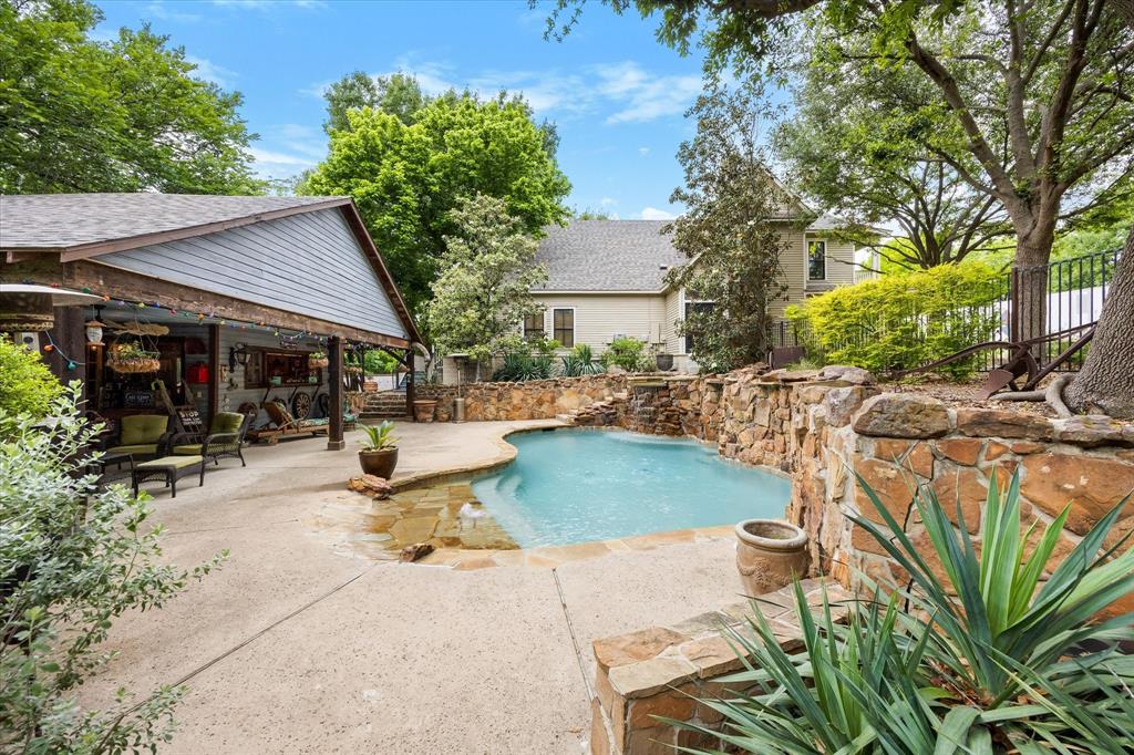 Two Addresses. One price. Zero regrets. Set along historic Main Street, where the homes have character & the streets are lined with charm, this 1902 historic home stands out in so many ways. This property was made for unforgettable moments & lazy afternoons by the pool, lively evenings around the BBQ deck, guests coming and going, & plenty of space to relax when it all winds down. It offers that rare mix of presence, privacy, & personality, creating a setting that feels just as perfect for entertaining as it does for everyday living. The main home carries the soul of Main Street with so many original features still intact, giving it the kind of character that cannot be recreated. Thoughtful updates make it functional, comfortable, & welcoming for the way people live today, while still preserving the history and craftsmanship that make it special. Then the property really starts to show off...Out back is where it happens. The pool & outdoor living areas create a true retreat, but the pool barn might be the star of the show. With a fold-up window that opens straight into the party space, room to host, & additional space in the back, it was built for good times & easy living. It also includes a full bath with a clawfoot tub, while around the BBQ deck you’ll find access to another bathroom and a rustic outdoor enclosed shower.... Then the separate 2-bed, 1-bath guest home adds another layer of opportunity with its own generous parking, lg fenced yard, full laundry, & gorgeous kitchen with granite counters. Previously used as a successful short-term rental, it offers options for income, guests, extended family, or a work-from-home setup. When family or friends are staying over, they can simply pass through the wood privacy fence & join the fun at the pool... & there is MORE with an oversized, climate-controlled garage rounds it out, offering space for storage, vehicles, or whatever life brings your way. All of this, just minutes from the heart of downtown.