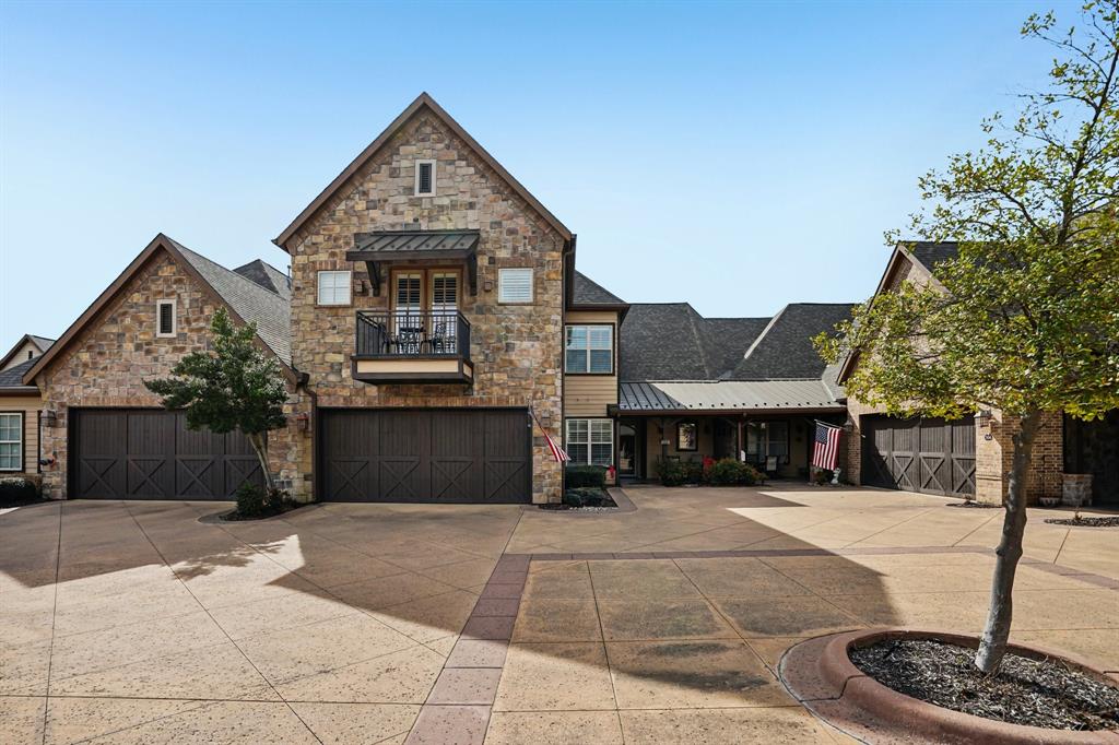 Welcome to elevated living in the gated community of Watermere at Southlake, where luxury meets convenience in a beautifully designed two-story villa. Located in one of Southlake’s premier 55+ communities, this 3-bedroom, 3.5-bath luxury villa offers refined finishes, thoughtful design, and access to resort-style amenities that make every day feel like a retreat. From the moment you step inside, rich hardwood floors throughout create warmth and continuity. The open living space flows effortlessly into a gourmet kitchen featuring stainless steel appliances, granite countertops, built-in wine refrigerator, and abundant cabinetry—ideal for entertaining or quiet evenings at home. The primary suite and additional bedroom downstairs offer privacy and comfortable main-level living, while upstairs provides a spacious bonus living area and private bedroom with full bath, perfect for guests, hobbies, or a dedicated office space. A built-in chair lift adds ease and accessibility between levels. Watermere has an impressive 35,000-square-foot clubhouse with extensive amenities. Residents enjoy concierge services, scheduled social events, fitness classes, water aerobics, golf access at Sky Creek Ranch, and a vibrant calendar of activities. Dining options include fine dining, a casual bistro, and evening cocktail gatherings—all within walking distance from this villa. Minutes from Southlake Town Square, shops, and medical facilities, this villa offers a rare blend of luxury, lifestyle, and low-maintenance living in one of Southlake’s most sought-after gated communities.