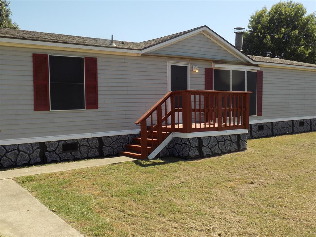 THIS HOME MEETS A MULTITUDE OF FINANCING POSSIBILITIES: FHA, VA, USDA, CONVENTIONAL, AND CASH.  Stunning, updated home that feels and looks like new. Home is trimmed out with K-rock Skirting; energy savings solar screens; carpet with vinyl plank flooring; new stove, dishwasher, faucets, ceiling fans, and light fixtures. This home is light and bright with an open floor plan. It is smartly designed to use every bit of space. The yard is spacious and welcoming with large, beautiful trees, and could easily accommodate additional lot space for other buildings, such as a shop, playhouse for the kids or the essential craft building, while still providing wonderful views. Home is located in a neighborhood  mixed with brick home and the very alluring country appeal; it is located close to the city of Springtown, as well. Springtown has a variety of dining spots, shopping and community activities, and has easy highway access in many directions. The home is a remarkable buy in a well established neighborhood with many amenities that are associated with more expensive homes. Come take a look and see the opportunities this home has to offer.