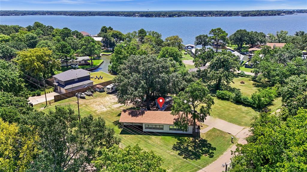 Charming 2 Bedroom, 2 Bath Home Walk to the Lake!
Don’t miss this beautifully maintained 2 bedroom, 2 bath home just a short stroll from the water! Perfectly located for lake lovers, this home offers year round enjoyment with easy access to a boat ramp and fantastic fishing spots just minutes away.
Enjoy the convenience of a 2 car carport, ideal for vehicles or lake toys, and relax on your front lawn after a day on the water. Inside, you'll find a comfortable, open floor plan with plenty of natural light, spacious bedrooms. 
Whether you're looking for a weekend getaway, a vacation rental, or a fulltime residence, this lake close property offers the perfect blend of relaxation and recreation.

Highlights:
2 bedrooms 2 full baths
Walking distance to the lake
Boat ramp access
Great fishing right nearby
2 car carport
Peaceful setting with outdoor space

Live the lake lifestyle you've always wanted. 
Schedule your showing today!