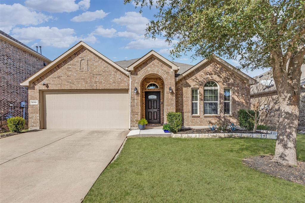 Charming single-story home in a fantastic neighborhood with outstanding community features, zoned to highly desirable Prosper ISD. This open-concept floor plan showcases a spacious living room with a cozy fireplace, seamlessly connected to a well-appointed kitchen featuring a large island and gas cooktop — ideal for everyday living and entertaining. A private study with French doors is thoughtfully positioned at the front of the home, perfect for working from home. The dining room offers generous space to host family and friends. Tucked away at the back of the home, the primary suite provides a relaxing retreat with an ensuite bath complete with a soaking tub, oversized shower, and walk-in closet. Recent updates include brick flower beds, a new front door, updated lighting, and an entry ramp for easier access to the front porch. Additional highlights include engineered wood flooring, neutral tones throughout, and a covered patio for outdoor enjoyment. Located in Prestwyck, residents enjoy access to a 17-acre city park with a splash pad, playground, zip line, and walking trails, along with a community pool, basketball courts, and scenic pavilion. Conveniently close to medical centers, shopping, and just a short drive to historic downtown McKinney Square.