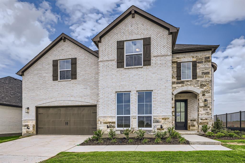 This home has plenty of curb appeal with a gorgeous combination of brick and stone along with cedar accent shutters. The foyer of this home will take your breath away with the elegant spiral staircase, which is further enhanced with natural light from the windows nearby. The study is generously sized at 12 ft x 15 ft providing enough room for two people working from home or it could serve as a quiet location for homework. Situated off  the 3-car tandem garage is a convenient mud room, a powder bath and a sizable utility room with plenty of space for a washer, dryer and more. The family room features a cozy fireplace and overlooks the chef's kitchen boasting a large working island with additional seating, a corner walk-in pantry and a butler's pantry that provides easy access to the formal dining room. The main bedroom is the perfect retreat with a bay window and elegant dual doors into the main bath which offers split vanities and a spacious walk-in closet. Upstairs, there’s two additional bedrooms, two full baths, a spacious game room and a media room. Rounding out the plan is a 3-car garage and a fabulous outdoor living space, perfect for year round entertaining. Our designers have chosen the most incredible quartz, wood and tiles to finish this home out!