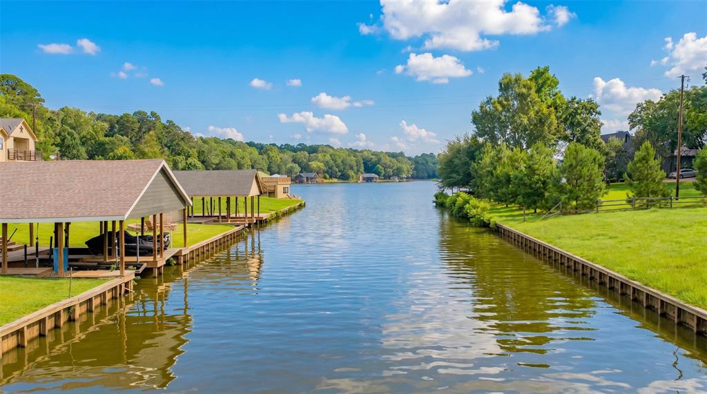 Build your dream lakehouse on this exceptional waterfront lot in the prestigious Oaks subdivision on beautiful Lake Cypress Springs. Offering 1.242 acres with mature trees and a stunning setting, this prime homesite enjoys desirable morning sun and a peaceful waterfront location. Utilities are available, making it ready for your custom build. Surrounded by upscale homes and accessed by a scenic drive through this gated community. The Oaks provides an exclusive lifestyle on one of the most sought after lakes in East Texas. Don't miss this opportunity to create your perfect waterfront retreat and enjoy all that Lake Cypress Springs has to offer.