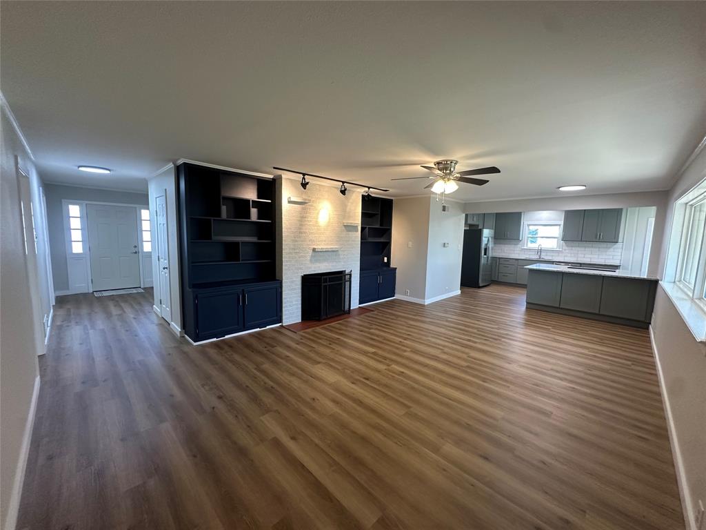 If you are looking for an open concept home with versatile space, here it is. The home is fully renovated. The primary bedroom has his and her closets and an adjoining full bath. The secondary bedroom also connects to the full bath. There is a large room that could be used as an additional bedroom, secondary living space, office, or play room. There is a second full bathroom just outside of this room. The kitchen has granite countertops and stainless steel appliances, refrigerator included. The laundry room is conveniently located and allows for a full sized washer and dryer. The yard is fully fenced and offers a covered patio, extended deck and a storage shed. Available now! 

**Tenants will be required to make 3x the rent, must provide good rental history, and pay a $50 deposit per person over 18. Credit will be evaluated, 620 or higher preferred. First and last months rent due upon signing, as well as a $2000 security deposit. Pets welcome. Breed restrictions apply due to insurance.**