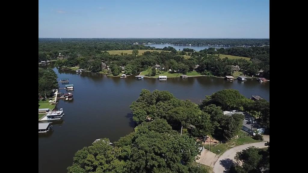 Come buy 2 lots for $20,000 with fence posts around the perimeter for your new privacy fence. You will be buying 114 Navarro Dr and 116 Navarro Dr with your offer.  Don’t miss this incredible opportunity to own 2 side-by-side beautiful wooded lots located in the Cedar Creek Reservoir area. These 2 prime lots boast 80 feet of serene road frontage, offering the perfect setting to enjoy peaceful lake living. Nestled in one of the most desirable areas of the lake, the property features lake access nearby, making it an ideal location for your dream lake house, weekend retreat, or short-term rental investment.

Enjoy easy access to the water with private lake access and to the dock, perfect for fishing, tying up a boat, or simply unwinding by the lake. The lots are just a few blocks from a private boat ramp, offering convenience for boating and water recreation. Manufactured homes are allowed, giving you flexible building options to suit your lifestyle and budget. Check with the HOA to see all of the different types of homes allowed.

Surrounded by natural beauty and located in a quiet, relaxing area, these 2 lots are priced with good value by a motivated seller, making it an exceptional deal. Whether you're looking to build, invest, or escape to the water, this improved lot won’t last long.