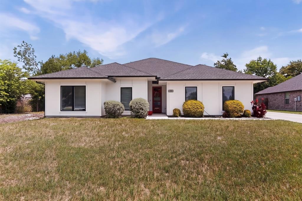 Beautiful Contemporary home in the heart of Hachie with 3 bedrooms & 2 bathrooms and an 11 x 10 study could be used for 4th bedroom. Home is situated on an oversized lot with close proximity to downtown Waxahachie.  Over sized windows in the large living room great for access to natural light. The home features tall ceilings throughout, Kitchen with custom ceiling height cabinets, stainless steel appliances, gas range, large granite counter top island with storage. Beautiful master suite has a large walk in shower, freestanding pendant tub with waterfall tub filler, walk-in closet and incredible views through the over sized windows. Split bedrooms offers privacy, . Bring your highest and best offer today.  This will not last long...Priced to sell quick!!