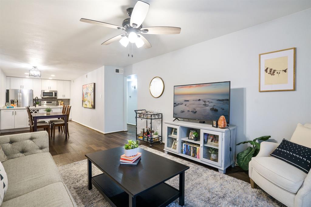 PRICE IMPROVEMENT— now offered at $189,000. Real estate happens when life changes, and this fully updated 2-bed, 2-bath condo in the heart of East Dallas is built for exactly that kind of chapter— whether it's a first home, a thoughtful downsize, or a smart investment in one of Dallas' most consistently in-demand pockets. The open, functional floor plan is anchored by a beautifully upgraded kitchen featuring quartz countertops, stainless steel appliances, a double-basin stainless sink with upgraded fixtures, classic subway tile backsplash, and a built-in wine rack. Wide-plank LVP wood-look flooring runs through the main living areas for a clean, cohesive feel. The spacious dining area flows seamlessly into the living room and opens to a private balcony overlooking the community courtyard and sparkling pool— ideal for morning coffee or unwinding at the end of the day. Both bedrooms are thoughtfully separated for added privacy, each filled with natural light, finished with 2-inch blinds, and paired with its own recently remodeled bathroom featuring upgraded fixtures, new vanities topped with quartz counters, tile flooring, and ample storage. Additional highlights include ceiling fans throughout and a stacked, full-size washer and dryer that conveys with the unit. Ideally located near Hwy 75, SMU, White Rock Lake, NorthPark Center, Central Market, Greenville Avenue, the DART rail, and nearby bike trails— and just minutes from downtown Dallas. Zoned to sought-after Mockingbird Elementary. A rare opportunity for low-maintenance living in one of Dallas' most convenient and connected neighborhoods. Schedule your showing today.