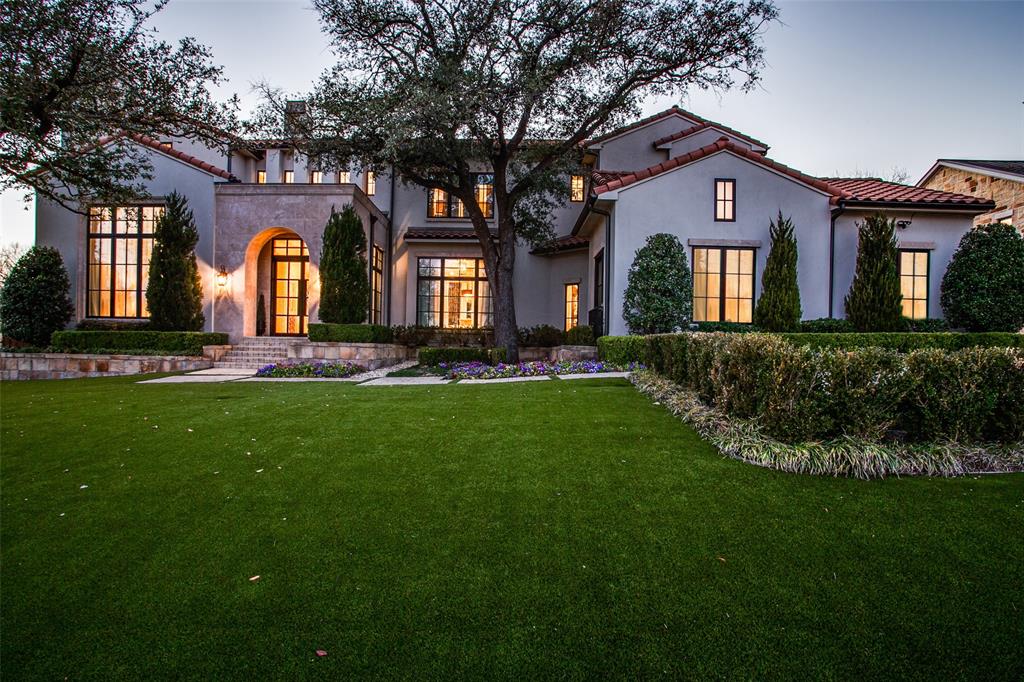 Nestled inside the gated Iris Hollow, this Mediterranean inspired estate's distinctive architectural touches include wood beam detailing, vaulted ceilings, expansive windows, and a spacious, open floor plan. Upgrades abound--from the designer lighting, quartzite waterfall island, and temperature controlled wine room, to the surround sound and smart home features--no detail was overlooked. The floor plan was thoughtfully designed and offers a primary suite and guest suite on both levels. The game room features a refreshment bar and media room which offer endless possibilities for in-home entertainment. The exterior amenities include a heated resort style pool, putting green, and an outdoor kitchen and bar, with a fully turfed yard. All of these can be enjoyed from the comfort of a four-season patio with a fireplace, built in commercial heaters, and surround sound. Whether entertaining or enjoying al fresco dining, the covered patio functions as an extension of the main living area.