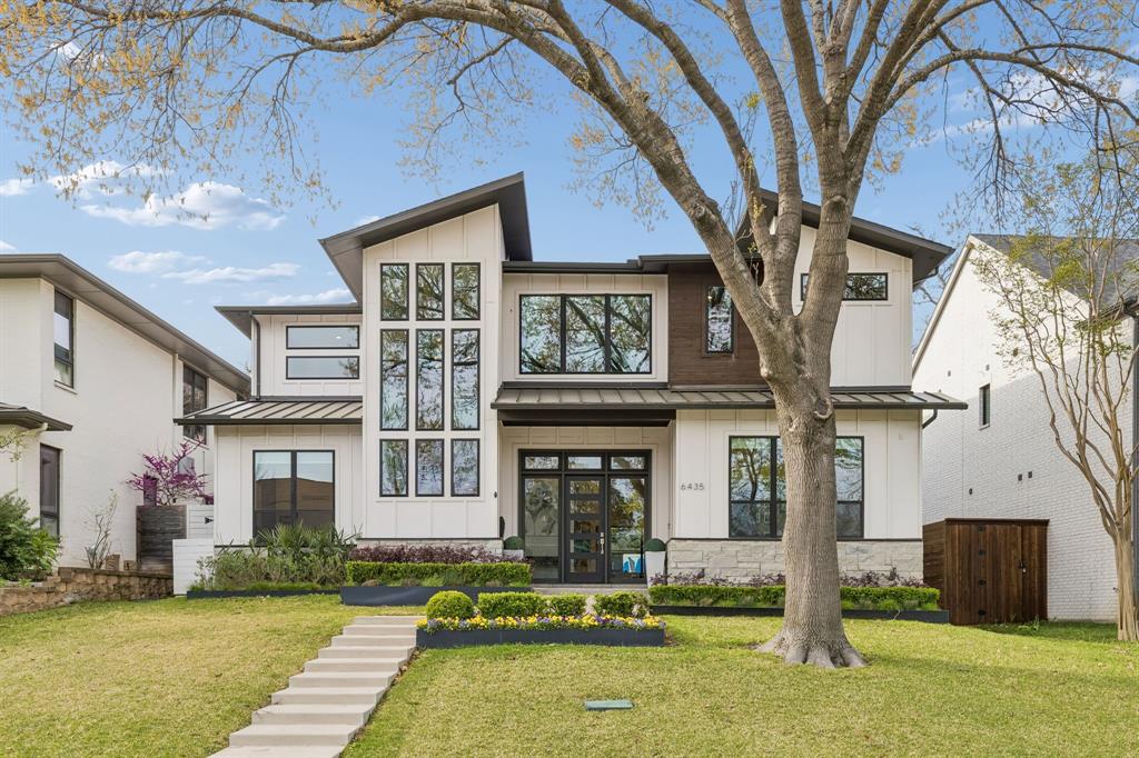 A 2019 built modern residence thoughtfully designed and constructed by Keen Homes, offering 4,111 square feet with 4 bedrooms and 4.5 bathrooms. The home showcases high-end craftsmanship, sleek contemporary finishes, and an efficient floor plan that supports both daily living and entertaining. Set on an elevated lot on the north side of the street, the property offers a strong sense of presence from the moment you arrive.
The main level features an expansive open-concept living-dining area anchored by a well-appointed kitchen with top-of-the-line appliances, ample cabinetry, and clean, modern styling. A signature feature is the 15-foot pocketing movable glass wall system, creating a seamless connection to the outdoor living space and enhancing natural light throughout the interior.
Outdoor amenities include a RBSandler pool with spa. Phantom screens add comfort and flexibility to the downstairs outdoor living space as well as the terrace off the upstairs primary suite. A turfed backyard provides a clean, green look with minimal maintenance. The main level also includes a private office and a downstairs ensuite bedroom, offering options for guests or multi-purpose use.
The primary suite is located upstairs and includes a fireplace, soaking tub, separate shower as well as an oversized walk-in closet. Two additional upstairs bedroom suites provide private baths and generous space.  A secondary living area upstairs includes a beverage center, creating a convenient lounge or media space. Additional highlights include a rear-entry garage with an electric car charger, mudroom and oversized pantry.
 Located in Lakewood near White Rock Lake, the property offers proximity to trails, parks, and neighborhood conveniences. Lakewood Elementary and Lakehill Prep are within walking distance. This is a rare opportunity to own a modern home with premium build quality, refined finishes, and exceptional indoor-outdoor flow.