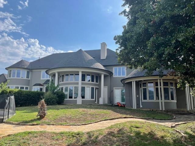 Luxury living in this 8000 sq ft 2.22 acre mansion with 2 swimming pools, a tennis court that can be turned into a pickleball court, a newly drilled well, custom chicken coop, an 8 foot fence surrounding the 2 acres and much more. This home had a $1.2M beautiful renovation in 2017. Set on 2 acres, this 6 bedroom, 9 bathroom estate includes a beautiful grand staircase when entering, a back staircase, hidden room, movie room, gym, game room, office, mother-in-law suite, large laundry room, 4-car gigantic garage, tons of storage, and so much more.