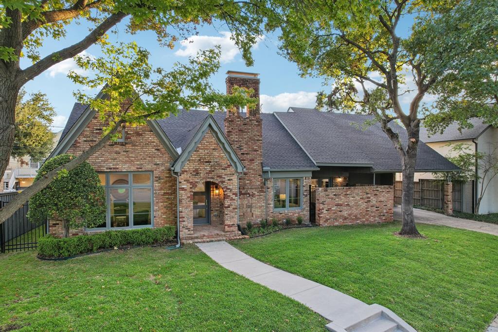 Charming, thoughtfully renovated Tudor home in a prime University Park location across from Barns Park. Off the covered porch is an entry flanked by a private office and family room with fireplace. The family room opens to the chef's kitchen which boasts a large island, refrigerator,  gas cooktop, oven, convection oven-microwave, and an adjacent breakfast room. An intimate living room is located opposite the breakfast room. The primary bedroom is located downstairs and features dual sinks, a glass-enclosed shower, and sizable walk-in closet. A second ensuite bedroom with a walk-in closet is also located downstairs. A laundry room and powder bath complete the downstairs of this home. Upstairs are two secondary bedrooms and an expansive shared hall bath with dual sinks and glass-enclosed shower. Exterior features of this home include a front courtyard and a back deck. Seller improvements: replaced electrical and plumbing throughout, replaced roof, replaced windows, installed sprinkler system, added one HVAC unit, added 26 piers to the foundation, installed foundation fans, added insulation, and installed a tankless water heater. Two blocks from University Park Elementary, three blocks from Holmes Aquatic Center and Curtis Park, and walking distance to Snider Plaza Shopping Center.