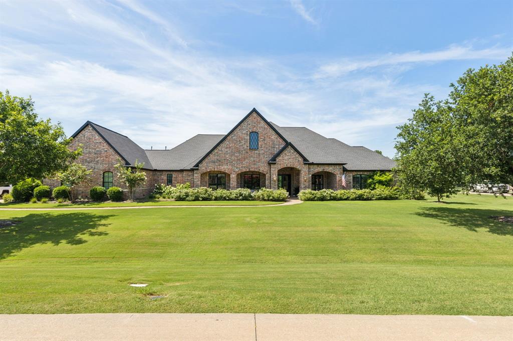 Rare opportunity to own this stunning 1 Story Paul Taylor a second time in 2 years due to the seller's unexpected relocation.  If you missed this masterpiece carefully reimagined by a professional designer in 2024 ,now is your chance to call it home.  This property returns  with a few thoughtful enhancements including blown in insulation, 16ft solid iron door, updated sound system throughout and is as close to perfection as it gets. 
This is the ultimate entertainment dream home where every feature was designed for enjoyment and luxury. 
This expansive residence boasts a dedicated entertainment wing w state of the art game room & fully equipped theater.Spacious living adorned w lux finishes,carefully chosen lighting,ventless fp,custom shelfing & panoramic windows seamlessly connecting the interior to the lush exterior. Dream gourmet kitchen features marble, hand crafted backsplash,premium appliances,refrigerated drawers and a expansive butlers pantry.Stunning Executive office dbls as guest suite w separate entrance & outdoor patio.Step outside to the picturesque,easy-care backyard that rivals homes featured in Better Homes &Garden.A perfect gathering space boasts swings fire pit,serene water features,garden and more.  This home truly takes Paul Taylor's most sought-after 1story to the next level with every detail carefully designed,planned & crafted w only quality materials in mind.