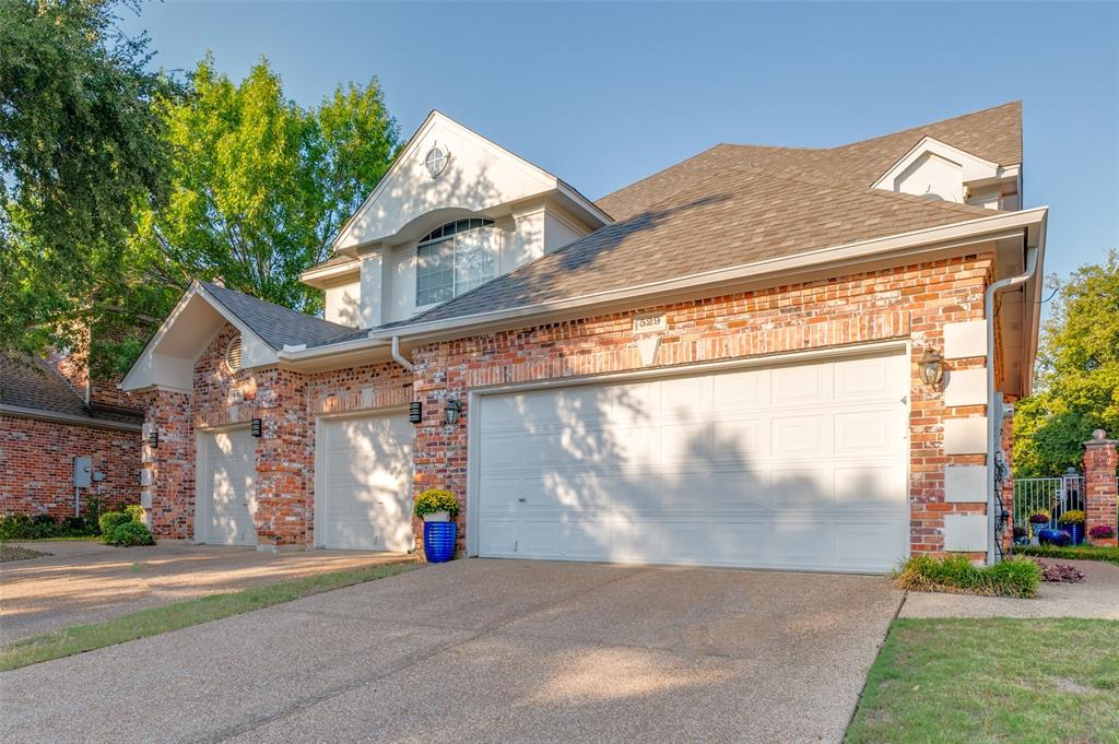 Welcome to 529 Lochngreen, a beautifully maintained townhome in the gated Lochngreen Village community offering low-maintenance living in a prime Arlington location. The light-filled open floor plan features spacious living and dining areas, high ceilings, and wood-look floors throughout the main level. The kitchen offers abundant white cabinetry, granite countertops, and breakfast bar seating that flows seamlessly to the living room and private patio—perfect for entertaining. The large primary suite boasts a walk-in closet and ensuite bath with dual sinks, soaking tub, and separate shower. Secondary bedrooms are generous in size and ideal for guests or a home office. Enjoy the convenience of an attached garage, HOA-maintained exterior, and beautifully landscaped surroundings. Centrally located with quick access to I-30, shopping, dining, Lake Arlington, and the Entertainment District. Move-in ready and easy to love!