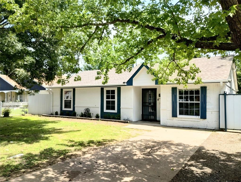 Motivated Seller! This charming established neighborhood in the heart of Pleasant Grove provides the perfect balance of everything a first time home buyer, or someone looking to upgrade, nice sized bedrooms,2 full baths, a brick woodburning fireplace and ceiling fans in every room with close proximity to Highways 175 and 30, downtown, shopping and schools and parks. The garage has been converted to a dining room so it is approximately 200 additional sq ft. more than the 1,353 sq. ft listed on DCAD.  This home has been lovingly taken care of for years and features a tall metal privacy fence enclosing the backyard with vehicle access to the covered workshop car port.  The kitchen has been expanded, 4 year old roof, well maintained HVAC, updated windows, driveway and covered parking.
