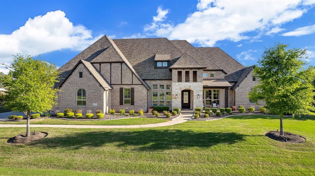 Luxury at its finest! This stunning custom home located in the heart of Prosper in the highly sought after, prestigious gated community of Christie Farms on an acre lot is a rare find! Beautiful curb appeal with inviting front porch! This one and a half story home has main living area on the first floor with Media Room, wet bar and full bathroom up. The open and airy floorplan great for entertaining and daily living. Extensive upgrades throughout! Resort style, back yard oasis with plenty of space, sparkling pool, covered patio and outdoor kitchen, turf area with putting green just in time for summer! Zoned for the new Walnut Grove high school. MUST SEE!