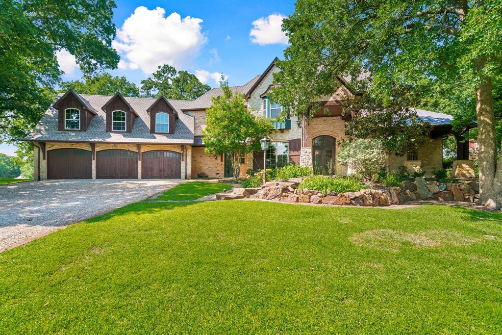 Excellent quality property! Private gated luxury ranch on 42 plus acres located less than 1 hour from Dallas. Gorgeous grounds and landscaping with a park like setting. Ideal family compound this property offers a luxury main house, tranquil saltwater pool with cabana outdoor living areas and a party barn with a full apartment. The home exhibits exquisite craftsmanship, with an expansive open floor plan that can accommodate large family gatherings. Light and bright design with beautiful panoramic views. Stunning interiors with hand scraped hardwood floors, high ceilings, crown molding, stone fireplaces, designer lighting and hardware. Chef’s kitchen with commercial appliances, gorgeous marble counter tops and ample storage. First floor primary suite has a fireplace and opens to outdoor living area overlooking grounds. Stocked ponds, sandy loam soil and majestic oak trees create the perfect ranch setting. Ideal family compound ranch, wedding venue or corporate retreat! Zoned ETJ!
