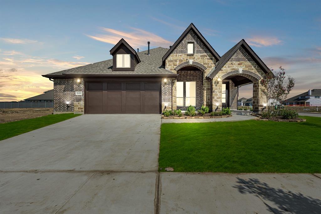 Newly Built & Ready NOW! Beautiful traditional colors inside & out this 1.5-story Bloomfield Home. This Dogwood III plan hosts a spectacular kitchen with a vaulted ceiling, SS appliances, gorgeous granite countertops, all with custom gray painted cabinetry! Primary Suite and 2 more bedrooms located on the first floor, as well as an open Dining off of the entrance. The combined living space is lined with windows that fill the home with light, and the upstairs game room outlook makes for a breath-taking view - a must see! Appealing wood-look tile floors in common areas great for furry friends. Bedroom 4 & Bath 3 found upstairs, along with a built-in desk in the Game room. You'll fall in love with the 2 outdoor living spaces: a huge front porch that's made for relaxing on this quiet street looking towards a greenspace, and the covered back patio with a gas stub to easily connect a grill! Community Pool, Playgrounds, Trails & more all nearby! Visit Bloomfield at Union Park to tour today.