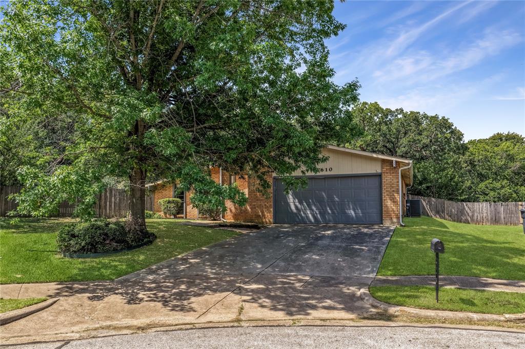 This is the fixer upper you are looking for! Popular floorplan? Check! Large cul-de-sac lot? Check! Mature trees? Check! This home needs more love than a Cowboys fan in January. Located in the Woodfield Add subdivision, this property offers approximately 1,911 square feet with 3 bedrooms, 2 bathrooms, multiple living areas, and a 2-car garage. The home features a functional layout with large common spaces, fireplace, covered rear patio, mature trees, and a private backyard setting backing to wooded surroundings. Major mechanical systems including the HVAC system and water heater were replaced in 2019, providing a strong starting point for renovation. The property requires significant repairs and cosmetic updating but offers substantial upside potential for investors, flippers, landlords, or owner-occupants seeking to customize a home in a desirable location. Evidence of settling, and the roof needs repairs or replacement. Conveniently located near Interstate 20, shopping, dining, parks, and entertainment venues throughout Arlington. The surrounding area contains established homes with ongoing renovation activity and strong long-term ownership trends. This property presents an opportunity to add value through repairs and modernization while benefiting from the location, mature neighborhood setting, and larger lot characteristics not commonly found in newer subdivisions.