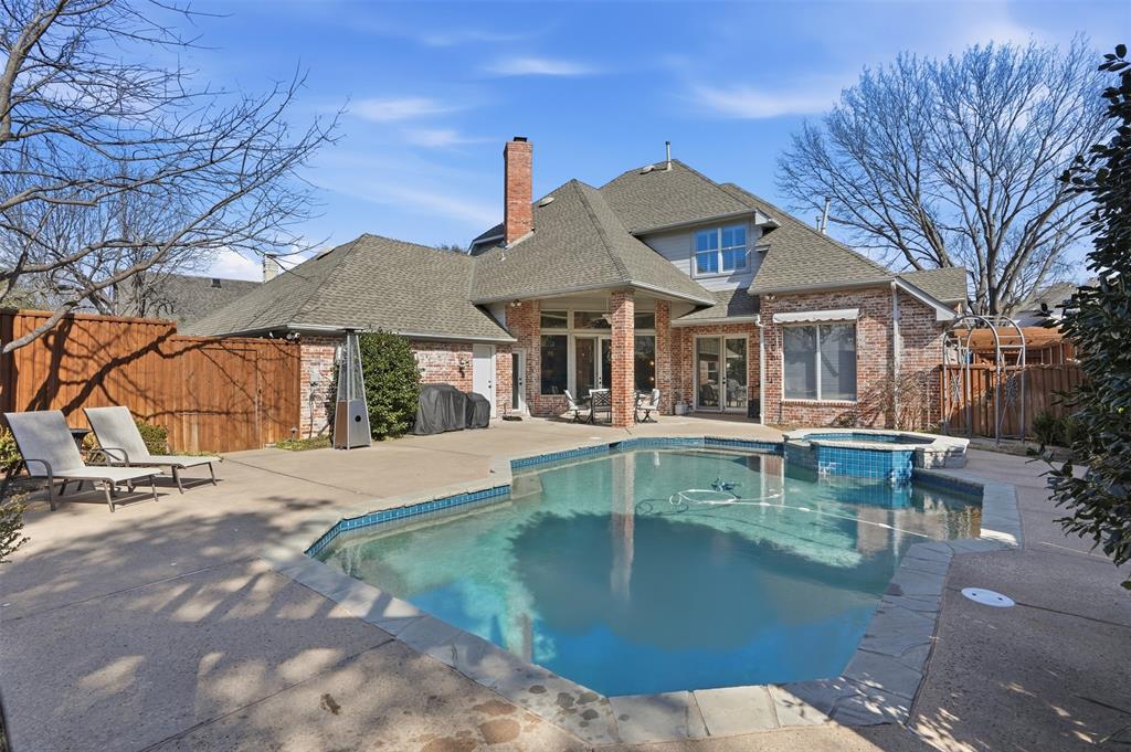 Welcome home to a bright, move-in ready residence in an established HOA lake community with walking trails, tennis courts, and a community pool—surrounded by mature trees and a true neighborhood feel. Hand-scraped wood flooring, soaring ceilings, recessed lighting, and a welcoming living area centered around a beautiful fireplace. Large windows and French doors bring in abundant natural light and open to the backyard for easy indoor-outdoor living. Gourmet kitchen and inviting with granite countertops, chef's island, tile backsplash, stainless steel appliances, and generous cabinet and prep space. A sunny breakfast dining area sits nearby with oversized windows and a modern statement light—perfect for casual meals and morning coffee. Large first-floor bedroom with luxury vinyl flooring and a full bath offers a convenient setup for guests.  Upstairs includes two generously sized bedrooms,  and a dedicated media room, ideal for movie nights, gaming, or a private lounge space. Upstairs, the stairs and second floor are finished with luxury vinyl flooring. Backyard with a covered patio, and a sparkling pool with attached spa—ideal for relaxing or entertaining. 
Convenient to the community lake and amenities, with nearby shopping, dining, and everyday essentials. Schedule your private showing today.