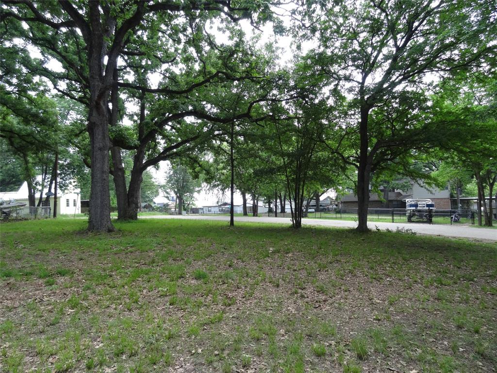Waterview across the street from this oversized corner lot in Tanglewood Shores.  Sellers own the remodeled doublewide next door on two lots - see MLS