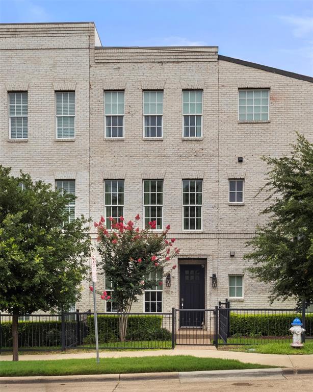 There's something distinctly timeless about this designer finished luxury townhome in the heart of North Dallas. With its classic brick façade, symmetrical lines, and sash-style windows reminiscent of the grand Georgian townhomes of England, Unit 807 carries an air of European refinement rarely found in North Dallas. Yet behind that elegant exterior lies every modern luxury you'd expect from a 2019 build.
The kitchen is nothing short of extraordinary. Carrara quartz countertops, crisp white soft-close cabinetry, a full Bosch stainless appliance suite, a 5-burner gas cooktop, built-in wine fridge, and an oversized island with breakfast bar set the stage — and the LG Café refrigerator with its built-in Keurig coffee machine ensures your mornings begin in style.
The open-plan living and dining areas are bathed in natural light, with the dining room anchored by a stunning statement chandelier that sets a tone of quiet elegance throughout. A private, gated front courtyard extends your living space outdoors.
The entire third floor is your personal sanctuary. The primary suite is generously scaled with a frameless glass shower, elegant vanity, and a walk-in closet worthy of the address. A well-appointed guest suite shares the upper level.
This home is engineered for modern living, a dedicated Tesla charger in the oversized garage means you'll never stop for gas again, while the tankless water heater delivers endless hot water on demand. Hardwood floors, vaulted ceilings, alarm system, and washer and dryer are all included.
The HOA at just $285 per month punches well above its weight, covering Spectrum internet, cable, water, sewer, trash, and landscaping — genuinely exceptional value that makes for truly convenient, low-maintenance living, even the washer dryer conveys.
All of this just minutes from LBJ Freeway, US-75, and the Dallas North Tollway, with the White Rock Creek Trail right at your doorstep.