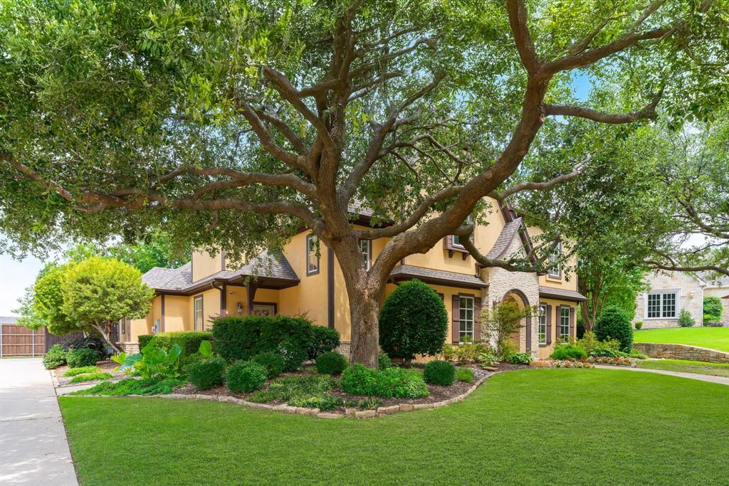 Welcome Home to this French Tudor custom home built by Kent Key Custom Homes. It is nestled in one of Denton’s most prestigious neighborhoods-Carrera Estates, w NO HOA. This well maintained and impeccably updated home truly has it all from curb appeal and beautiful mature trees, to soaring ceilings, abundant natural light, and open-concept that seamlessly blends sophistication and functionality. The spacious living room with gas log fireplace, creates a warm atmosphere perfect for relaxing. The chef’s kitchen is a showstopper with gas cooktop, double ovens, plenty of counter space, walk-in pantry and abundant storage. The home also boasts an elegant newly painted formal dining room and stunning new chandelier. A private office with custom built-ins provides the ideal space for working from home. The oversized newly painted primary suite, complete w backyard views, patio access, custom ladies’ study adorned with Serena & Lily wallpaper, and walk-in closet. The primary bath was remodeled and features separate vanities, French linen cafe' drapes, spacious shower and garden tub. Upstairs is a spacious game room, 3 large bedrooms, one w private bath and 2 sharing a Jack-and-Jill. Enjoy the spa like backyard oasis, featuring a sparkling pool and hot tub, outdoor kitchen area w built-in grill-bar refrigerator. This home is on an extra-lg lot that offers and privacy. The epoxy floored garage can be easily converted to 3-car and has oversized storage closet and custom Closets by Design storage. This beautiful home combines luxury, comfort, and location in one perfect package. Schedule a showing to see for yourself all that this gorgeous home has to offer!