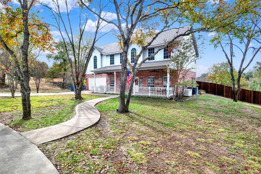 Tucked away on 4.5 private acres, 152 Valley View Court offers a rare blend of modern luxury and peaceful country living — just minutes from Fort Worth. This recently renovated estate sits at the end of a quiet cul-de-sac surrounded by mature trees and wide-open space, creating the perfect retreat from city life. Step inside to discover light-filled interiors featuring new flooring, fresh paint, a fully updated kitchen with sleek finishes, and elegant touches throughout. French doors open to a private office with a hidden safe room cleverly concealed behind custom built-ins — a truly distinctive feature.

The inviting living room showcases beautiful views of the property and a cozy fireplace, while the expansive upstairs family room offers endless possibilities for entertainment and relaxation. The primary suite is a true sanctuary, featuring a luxurious ensuite with custom tilework and a soaking tub designed for ultimate comfort.

Outdoors, your own resort-style haven awaits. Enjoy a sparkling oversized diving pool with a new pump and filter system, easily convertible to saltwater, surrounded by an expansive covered patio ideal for gatherings. The finished, air-conditioned pool house adds even more versatility — perfect for guests, a home studio, or fitness space.

Just minutes from I-20 and US-377, this exceptional property provides easy access to downtown Fort Worth, Weatherford, and the shopping and dining of Willow Park North. With space to breathe, room to grow, and the convenience of city amenities nearby, 152 Valley View Court offers a lifestyle of serenity, sophistication, and endless possibility.