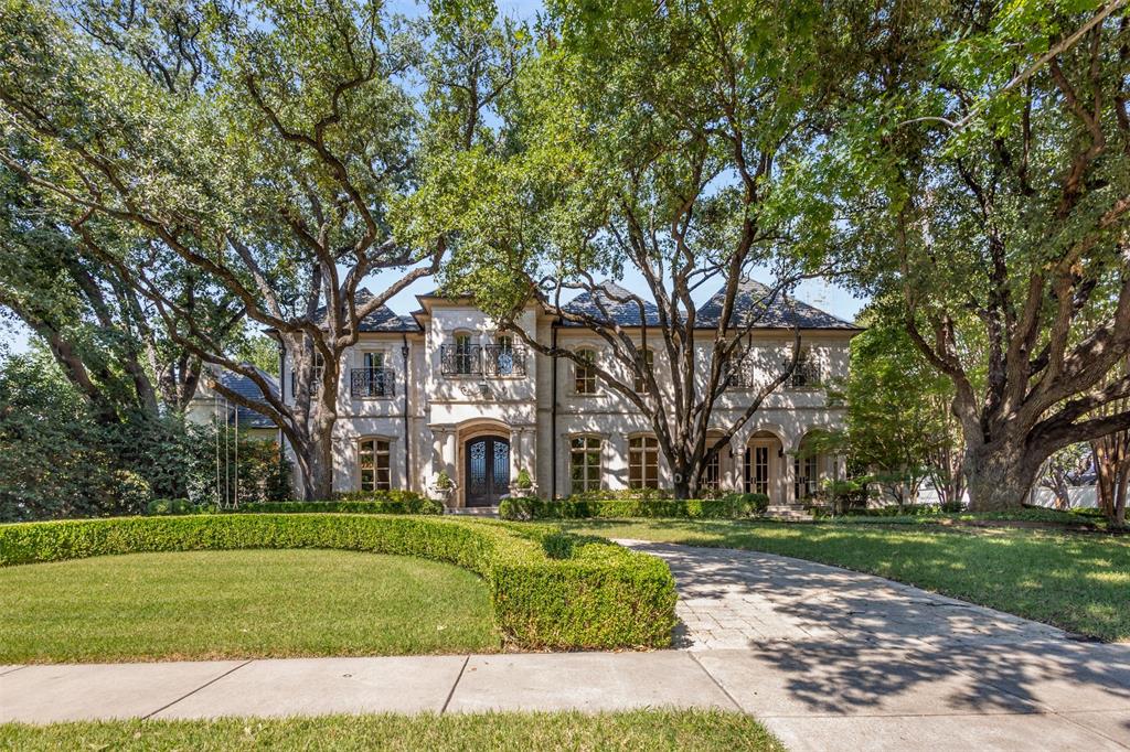 Welcome to 3600 Centenary, an exquisite residence in the heart of University Park that was recently refreshed with paint, new light fixtures and staging. Set on an incredible 0.601 acre double, corner lot, this home offers 8,970 sq ft of refined living space on 3 levels & an attached 3-car garage. A large entrance opens to 1st floor formals & boasts 11' ceilings, creating an expansive ambiance throughout. Home features 6 BR, 7.3 BA, storm shelter, office w fireplace, elevator to all floors, & separate media & game rooms both w wet bars providing great space for relaxation & entertaining. A thoughtfully designed layout seamlessly integrates indoor-outdoor living. The expansive family room overlooks a sparkling pool with separate seating area w fireplace. Enjoy alfresco dining at its finest in an additional 863 sq ft vaulted outdoor living room with fireplace, kitchen w wood-burning pizza oven, and built-in grill, enhanced by electric screens for year-round comfort. The yard features an arbored dining area, gas firepit, turfed play area, large grass yard, & fenced sport court. Truly a remarkable property!