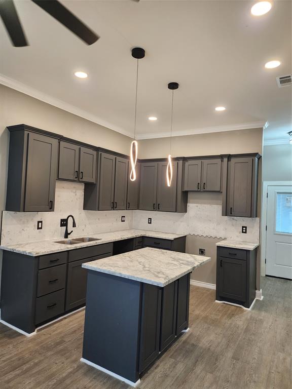 Modern Luxury Meets Easy Living! Step into this stylish 3 bed, 3 bath town home that's perfect for someone who loves luxury without all the extra space to maintain. Inside this 1,500 sq ft home you're immediately greeted by a bright, open living and kitchen area that blends modern design with cozy charm. The kitchen steals the show with its granite countertops, high-end appliances, and contemporary finishes, giving the space a true luxury feel.  While the main level offers a more intimate layout, it provides versatility to make the space truly your own. Whether you envision it as a cozy dining and entertainment area or a stylish extension of your culinary space.  Upstairs, you'll find a spacious primary suite that can easily serve as your personal retreat or be reimagined as a comfortable lounge or living room offering endless possibilities for how you live and relax. Finally enjoy a private garage, covered front entry, and modern brick and stucco exterior that gives this home exceptional curb appeal.