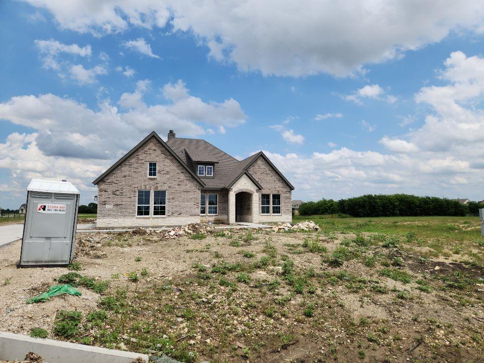 Estimated June 2026 completion! Ask us about our Trade In Trade Up program, we can buy your home! The Verbena floor plan features a modern, open-concept layout and the sought-after features today’s homeowners are searching for. With four bedrooms, three bathrooms, and a flex room, this plan boasts just over 2,400 square feet of functional living space. Upon entering the home off the front porch, you’re welcomed by an inviting foyer. Immediately to the left is a hallway with a bedroom, walk-in closet and full bathroom, as well as a linen closet. Across the foyer is a flex room, perfect for a home office, formal dining room or whatever need your family has for the space. Past the foyer is the family entry, with storage space and mud bench, which leads to the laundry room and two or three car attached garage. Through the entrance, the home opens up to a large family room with a stately fireplace. Adjacent to the family room is a gourmet kitchen, equipped with a walk-in pantry, ample counter space and an oversized island. Finishing off this open-concept living area is a dining space which overlooks the covered back patio. The remainder of this one-story floor plan is just off the living space. A hall leads to two bedrooms with walk-in closets, another linen closet and a shared full bathroom. The back corner of the home offers privacy for the owner’s suite, featuring a massive walk-in closet and bathroom with a dual-sink vanity, standalone soaking tub and glass-enclosed shower.