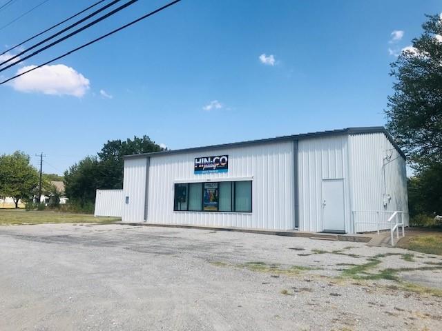 Check this OUT!  Lease the First 6 Months for $1800 a MONTH, then $2000 for the Second 6 MONTHS. Great location for a business, a nice metal building with a roll up door, two offices, front reception area, large storage area.  Home to a successful commercial printing business for years, and now an opportunity for a new tenant.  TI is investing 35 billion in a new facility just minutes away. Get in on the action.