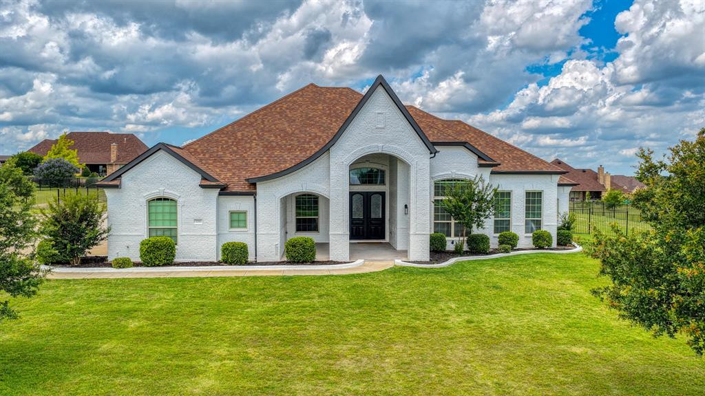 Located in a gated community in Aledo ISD, this custom-built home offers over 4,000 square feet of living space on a private 1-acre lot. Built in 2014 and completely updated 2026 with a BRAND NEW POOL AND SPA completed June 2026, the home combines space, comfort, and functionality in one of the area's most desirable neighborhoods. The kitchen sits at the center of the home with an oversized island, granite countertops, abundant cabinetry, and an open flow into the breakfast area and living room. Durable LVP floors run through the main living spaces, while the extended patio creates even more room to enjoy the outdoors. The spacious primary suite includes a dedicated office, a redesigned walk-in closet, and an ensuite bath with dual vanities, a soaking tub, and a walk-in shower. A remodeled guest suite, additional bedrooms, and a second office or flex space provide plenty of flexibility for family, guests, or hobbies.