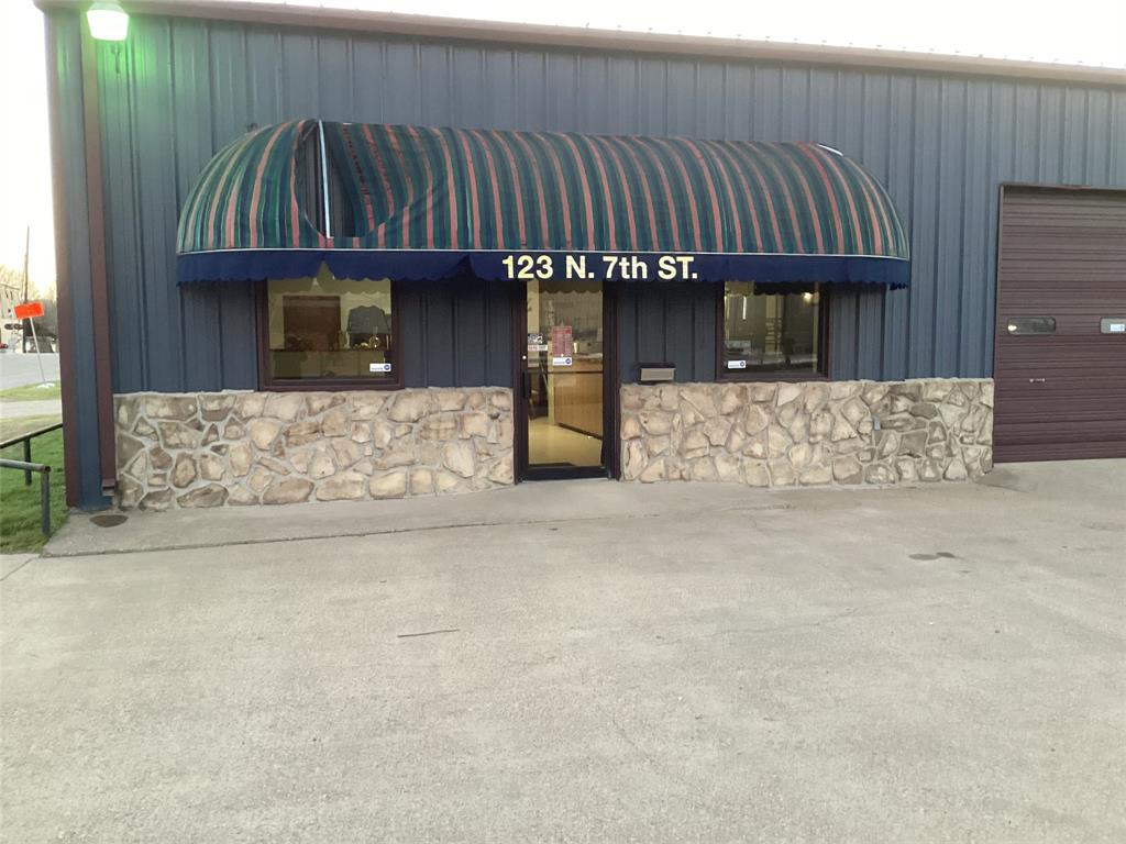 Great location very high traffic corner lot.  Shop has four lifts, and one Wheel alignment bay equipment conveys.  can develop a great customer base. Only qualified buyers for showings. Very large customer area and great small kitchen.
