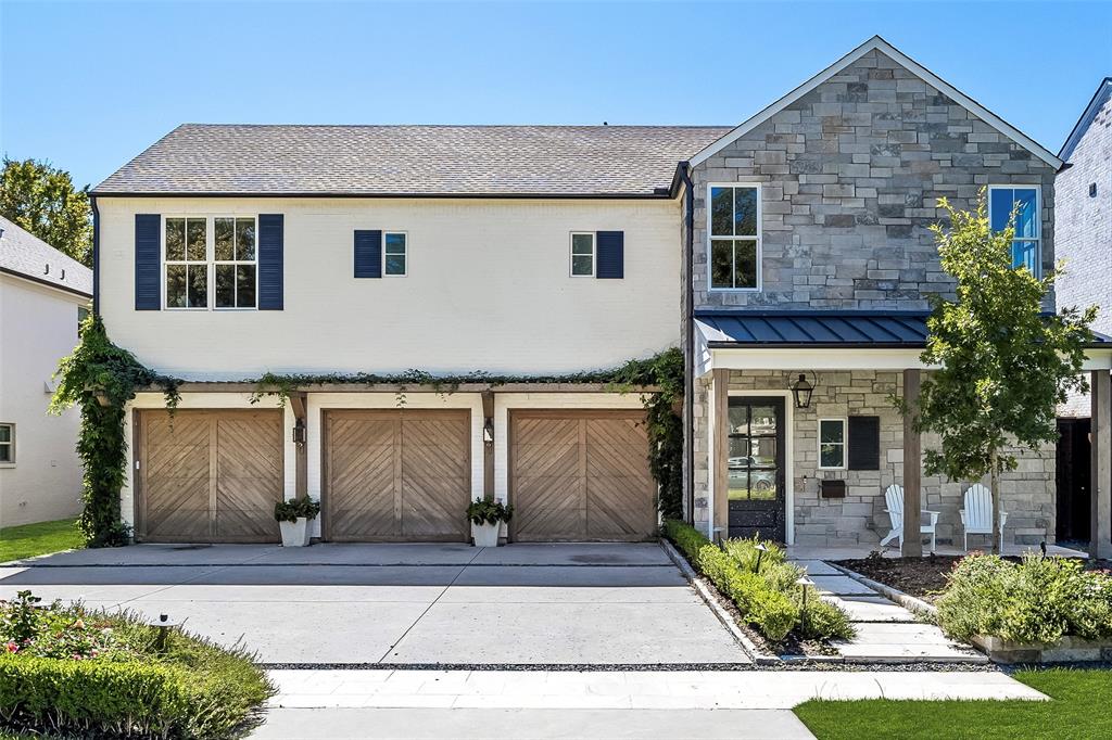 Built in 2018 by Heritage Blue Homes & designed by Chad Dorsey, this home defines luxury living, offering a seamless blend of indoor & outdoor living. As you step inside, you'll be captivated by the wide hallways, attention to detail & designer finishes. The home offers 2 options for a primary suite, one upstairs & one down. Both feature double vanities, soaking tubs, walk-in showers, & large closets. The gourmet kitchen boasts top-of-the-line appliances, an expansive quartzite kitchen island, & ample storage space. The second floor offers a playroom & bonus space that can be used as a home office or workout room. Each bedroom is accompanied by its own en suite bath. Step outside to discover a stunning pool & spacious green space. The screened-in porch with fireplace is an inviting extension of the home. Other notable features include foam insulation for energy efficiency, designer lighting & an abundance of natural light that floods the interior, creating a warm & inviting atmosphere.