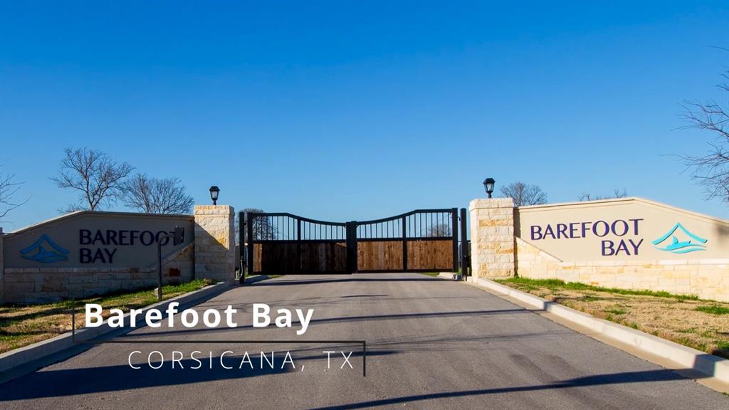 Exceptional waterfront opportunity on Lake Halbert! This stunning 1.30 -acre lot offers over 231 feet of prime lake frontage, providing expansive views and direct access to the water. Located in the exclusive, gated Barefoot Bay community, this property combines privacy, natural beauty, and resort-style amenities—just minutes from Corsicana and a short drive to the DFW Metroplex. Build your dream retreat and enjoy community features such as a luxurious clubhouse with kitchen and lounge, sparkling pool, fully equipped fitness center, and a scenic viewing deck overlooking the lake. Outdoor recreation abounds with a dock and available boat slips, community fire pit and beautifully landscaped green spaces. Whether for weekend getaways or your forever home, this lot offers the ultimate in lakeside living, with unmatched space, lifestyle, and 231+ feet of waterfront waiting for your vision.