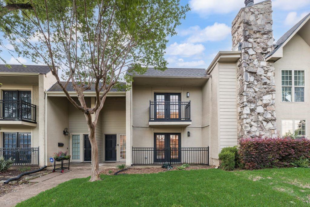 Beautifully updated two-story townhome in the heart of Lake Highlands offering 3 bedrooms, 2.5 bathrooms, a detached one-car garage, and stylish finishes throughout. Recent updates include refinished kitchen cabinetry with on-trend hardware, updated microwave and range, newer upstairs carpeting, refreshed bathroom fixtures, smart thermostats, and modern exterior lighting. The spacious primary retreat features a private balcony, custom walk-in closet, and an ensuite bath designed for comfort and relaxation. Two additional bedrooms provide flexibility for guests, family, or hobbies, with one bedroom also enjoying its own private balcony. The open-concept dining area flows seamlessly into a generously sized home office with balcony access, creating the perfect space for entertaining or working from home. Step outside to enjoy the beautifully fenced backyard with paver patio and grassy area, offering a private outdoor retreat ideal for relaxing, pets, or weekend gatherings.