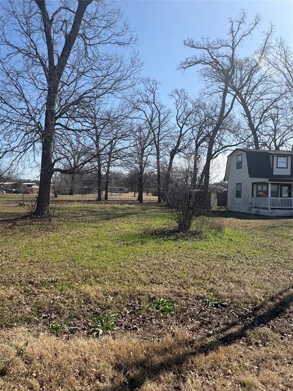 Great opportunity inside the gated community of Holiday Villages of Lake Fork! This 40x90 lot features several mature trees providing natural shade and privacy, and it’s located just a few blocks from the private boat ramp.

All utilities are available at the road (buyer responsible for tap fees). Flexible building options allow for a site-built home (minimum 750 sq ft), manufactured home, or RV. Deed restrictions apply.

Holiday Villages offers outstanding amenities including a clubhouse, swimming pool, private boat ramp, fishing pier, basketball court, and community activities. Enjoy being just minutes from world-famous Lake Fork — known as one of the premier bass fishing lakes in Texas.

Whether you’re looking for a weekend getaway, retirement spot, or investment property, this lot checks the boxes. Don’t miss your chance to own near Lake Fork!