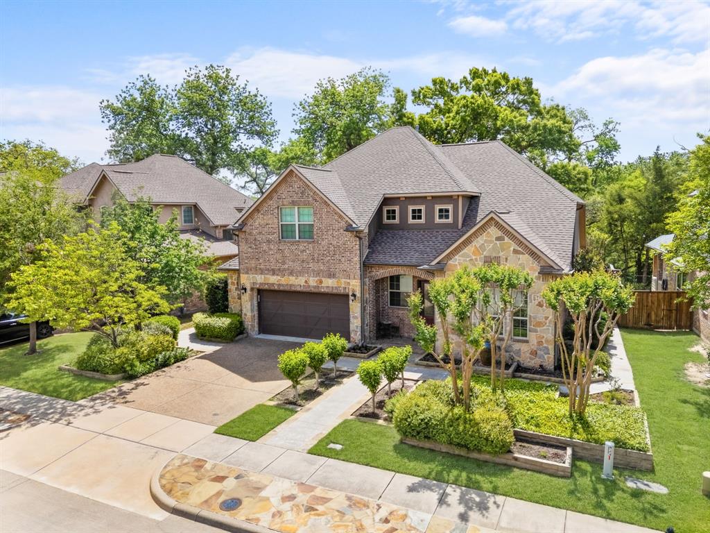 Immaculate home on a premium greenbelt lot in the heart of McKinney, this home is customized with a 2.5 space garage with built in storage cabinets and a workbench. The backyard has $100,000 investment in creating a hardscape oasis for outdoor enjoyment.  Upon entry hardwood flooring runs through out the first floor and on the stairs. From the foyer you can see the view of the picturesque backyard. The kitchen is open to the family room. Open the French Doors from the family room to your outdoor living space. Stone masonry boxes frame in mature landscape in front and back. Built in Barbeque grill is located on the covered patio. The kitchen has a spacious island and built in trash drawer, along with abundant cabinetry. The pantry is a true walk in pantry and is huge. The breakfast room enjoys the amazing view along with the primary suite. Architectural details abound with arched doorways, art niches and crown molding. Primary suite has a custom closet with built ins! Its a dream! Custom lighting in the office and dining room. Upstairs you will enjoy the media and game room along with 3 bedrooms and two bathrooms. New HVAC unit, 2026.  July 2026 2 New Hot Water Heaters installed. This home is a slice of Heaven in the Heart of McKinney just 10 minutes from our Historic square and close to 121 and I-75. Refrigerator, washer and dryer convey with the home.  Book your showing with showing time today.