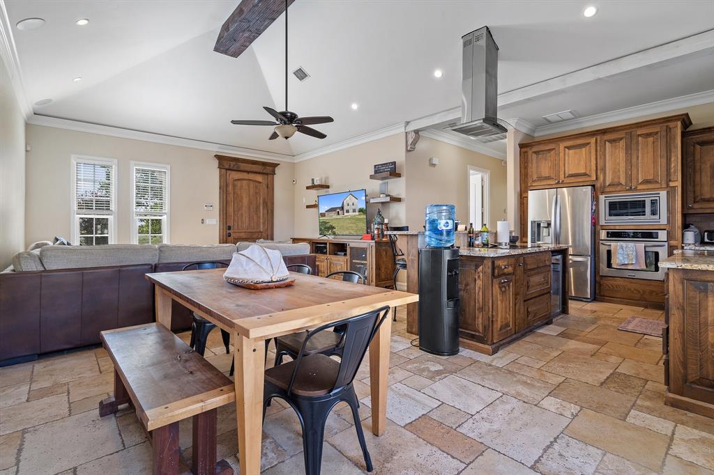 Discover this peaceful 4-acre property in Ponder, TX. The 2-bedroom, 2-bathroom home, built in 2015, features 1,310sqft of comfortable living space. An impressive but incomplete addition offers future potential with 4 additional bedrooms, 2.5 bathrooms, and 3 versatile living areas over 3 floors with a beautiful spiraling staircase connecting the first 2. Boasting a total of 5,120sqft after completion of the addition. The property includes a metal shop with electricity, perfect for use as a garage or workshop. The backyard is equipped with 8' privacy fencing and includes a covered patio. Additional features include 1 acre of pipe fencing and a tranquil setting that backs up to land owned by another developer, ensuring ongoing peace and privacy. There is also a small pond at the back of the property. Enjoy the best of both worlds with modern comfort and natural beauty in this spacious retreat, ideal for those seeking serenity and room to grow.

Buyer to verify all info within this listing.