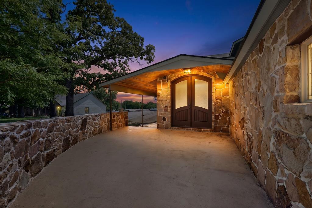 Back on the market at no fault of the seller or home:  Tucked beneath mature trees on 1.25 acres, this custom-style home offers the space, privacy, and lifestyle today’s buyers are searching for.
From the moment you arrive, the rich stone exterior and inviting covered entry set the tone. Inside, you’ll find 4 spacious bedrooms, 2.5 baths, and over 2,800 square feet designed for both everyday living and entertaining.
Step outside and it only gets better - a large inground pool, expansive patio, and wide-open yard create your own private retreat just minutes from town.
If you’ve been looking for room to breathe without sacrificing convenience, this is the one.