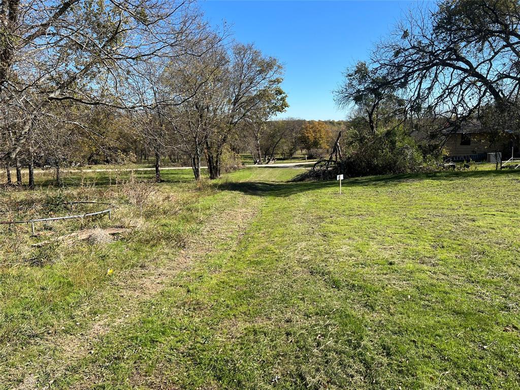 2 lots near the lake to build your cabin with access to Tawakoni thru a community park.  Voluntary HOA for permanent residents only which means you will need to build the home and live in it full time before approval of the membership for lake use, per HOA.  Lone Oak ISD, and must build or do a true modular home with Planning and Zoning approval! Sabine River Authority will approve septic system once engineered out to building spec's.  Minimum 900 sq ft.  with approximately 130 feet of road frontage and 116 feet deep.