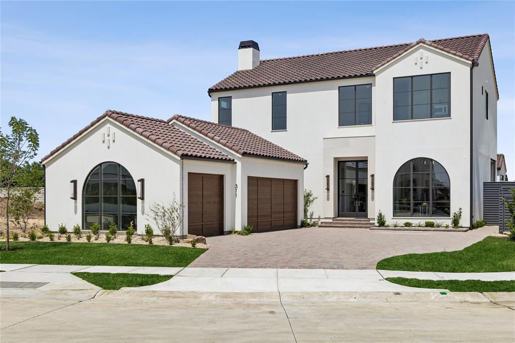 Experience timeless elegance fused with modern sophistication in this Santa Barbara Modern-style residence. Thoughtfully designed with both form and function in mind, this distinctive home offers 4 spacious bedrooms, 5 full bathrooms, and 2 half baths across a beautifully appointed floor plan. An open-concept layout highlights clean architectural lines, expansive windows, and seamless indoor-outdoor living. Elegant touches abound—from the refined wine room, sophisticated library, and a beverage station with a built-in Thermador coffee maker to a tornado-safe room for added peace of mind. With a private elevator and dual utility rooms on both levels, the home is designed for comfort, ease, and accessibility. Wellness and leisure take center stage with a private exercise room, sauna, stylish game and card rooms, and a full wet bar perfect for entertaining. Home automation enhances everyday living, making it efficient and carefree. Crafted with meticulous attention to detail, every element—from high-end finishes to intentional architectural flow—reflects the artistry of its construction. Nestled within Avadene at Las Colinas, a new luxury community of 73 homesites across 22 serene acres, the home offers the best of upscale living. Community amenities include scenic walking paths, pickleball courts, and a convenient mail center. Located at Las Colinas Blvd and La Villita Blvd, residents enjoy access to major highways, area airports, and top destinations like Water Street, the Toyota Music Factory, Las Colinas Country Club, and Campion Trails. Developed by Mark Alexander, president of Alexander Hunt Distinct Homes and Alexander Homes Development Company, Avadene is defined by architectural individuality—each home boasting a fresh, globally inspired design blending historic and contemporary influences. Own a truly exceptional modern residence in one of DFW’s most desirable new communities.