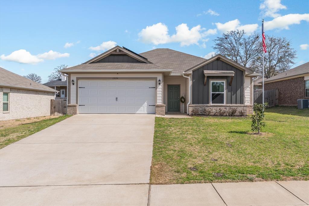 This one is just easy to love. Built in 2021, this 3 bedroom, 2 bath home sits in a quiet Lindale neighborhood and has the open layout everyone wants. The kitchen, living, and dining all flow together so you can cook dinner, help with homework, or host friends without feeling cut off from everything happening around you. The bedrooms are a great size, not tiny builder afterthought rooms, and the primary suite gives you your own comfortable space to unwind at the end of the day. Out back, you’ll find an extended concrete patio plus a deck, giving you plenty of room for grilling, birthday parties, or slow evenings outside. The solar panels help keep utility bills impressively low, adding real energy efficiency to an already newer home. All of this in highly sought after Lindale ISD. Homes this new, this efficient, and under $250,000 in Lindale do not sit around, so come see it before someone else calls it home.