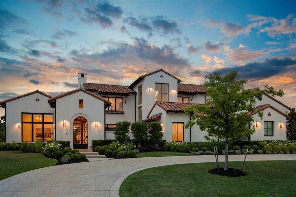 SUPERIOR luxury resort living on a double cul-de-sac street within the gated & guarded subdivision of Granada in Westlake. Refined, turn key, dialed in technology that feels like magic-- Control 4 system controls music, lights, pool & security & 11 televisions that will convey! The open kitchen is a culinary space that inspires: Wolf stove, Sub Zero + wine tower in main kitchen & secondary Sub Zero in discreet butler's pantry complete with Wolf steam oven, second dishwasher & third sink! Focal piece with Boos block style wooded island that is special.  An outdoor vibe like none other with: $300k worth of mature landscaping, spa, pool with tanning ledges, two custom waterfalls & fire pit.  Outdoor entertaining & cooking: Wolf grill, Green Egg, expansive dining & seating areas footsteps from the pool. Enter the residence through a tranquil courtyard & experience a waterfall, travertine seating area, turf and oversized metal pivot front door.   Elegance at every turn: wide plank wood floors throughout living areas and bedrooms, three fireplaces, wet bar with ice, refrigeration & bar seating, primary bath with dual private water closets, refrigerator drawers &  in-suite washer & dryer in one of the separate closets. Study & exercise rooms are on a private wing-- exercise room could easily be second office. Private tucked away guest suite enjoys double door view of the courtyard.  Every finish, every texture, every corner speaks of thoughtful luxury.  A PentaVia Custom Home home offering an opportunity to move in and start enjoying every luxury upgrade for comfort and innovation.  Pool bath off back game room,  outdoor shower & lighting rods too. Transitional, Modern & Mediterranean buyers will love this exciting but functional floorplan.  
Private lot, 4 car garage (gated) & circle drive. Check out the school possibilities with this prestigious address. Truly a better value than new construction options.